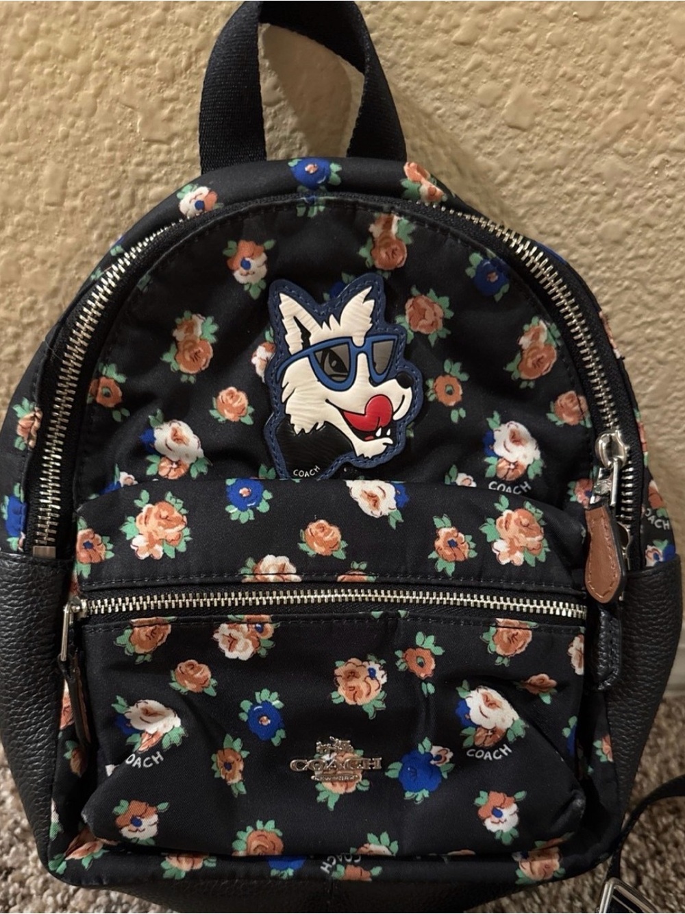 Coach Black Floral Mini Backpack with Wolf Patch Accent